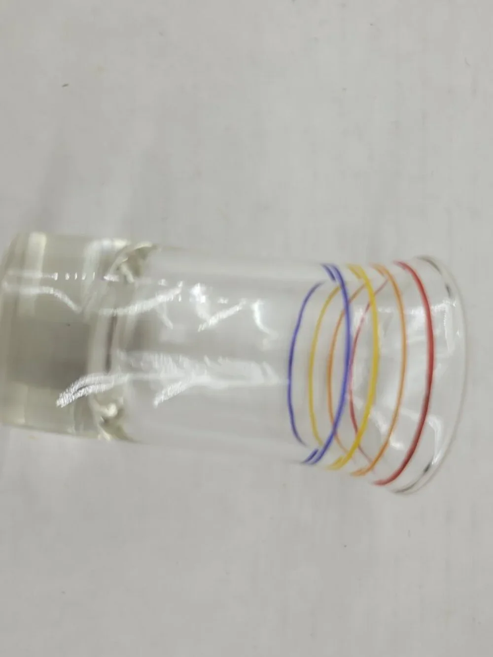 Vintage shot glass clear with orange red yellow blue stripes Mid-century Modern